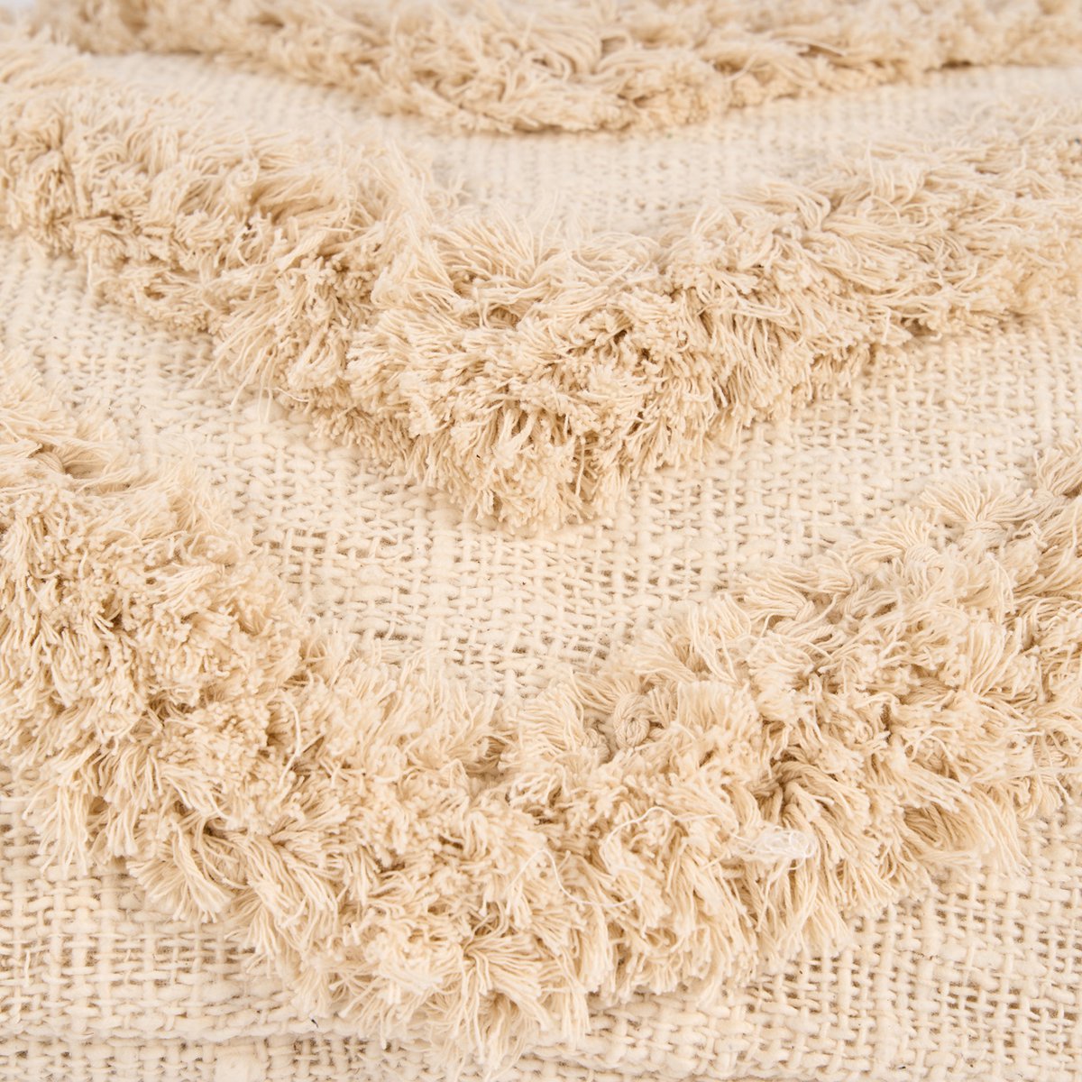 The Nomad Kussenhoes met kwastjes - Crème