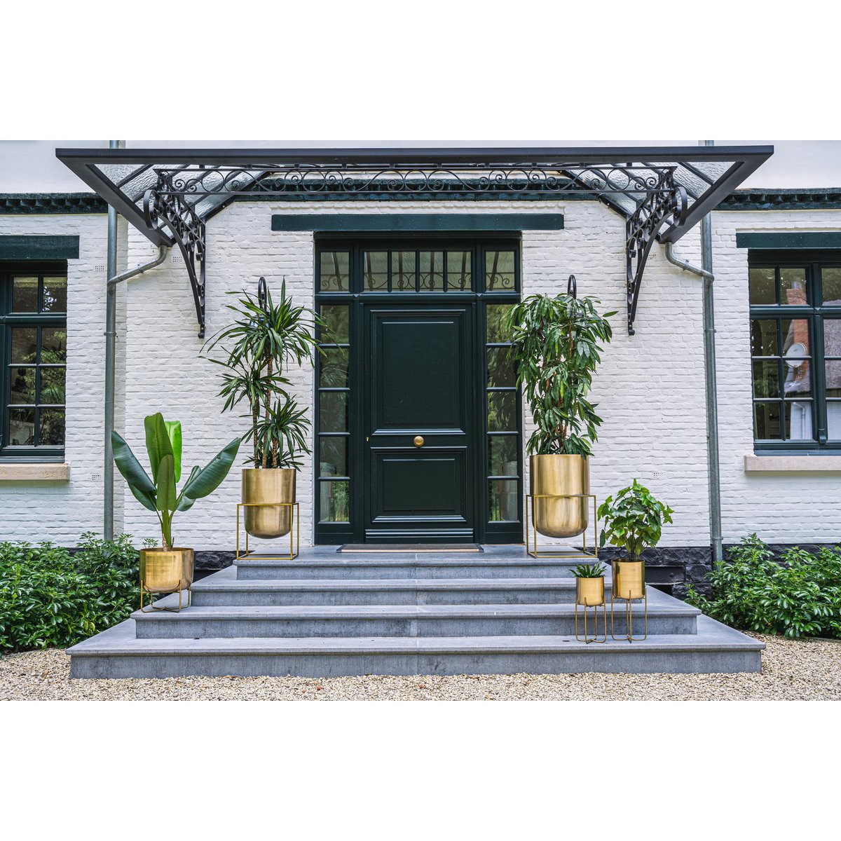 De koperplanter op stand - messing - l