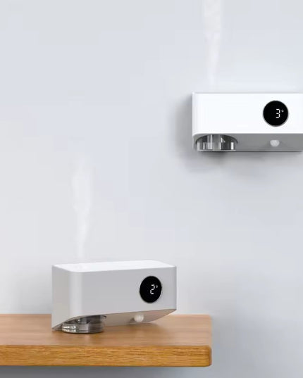 Mini parfumverspreider voor wandmontage
