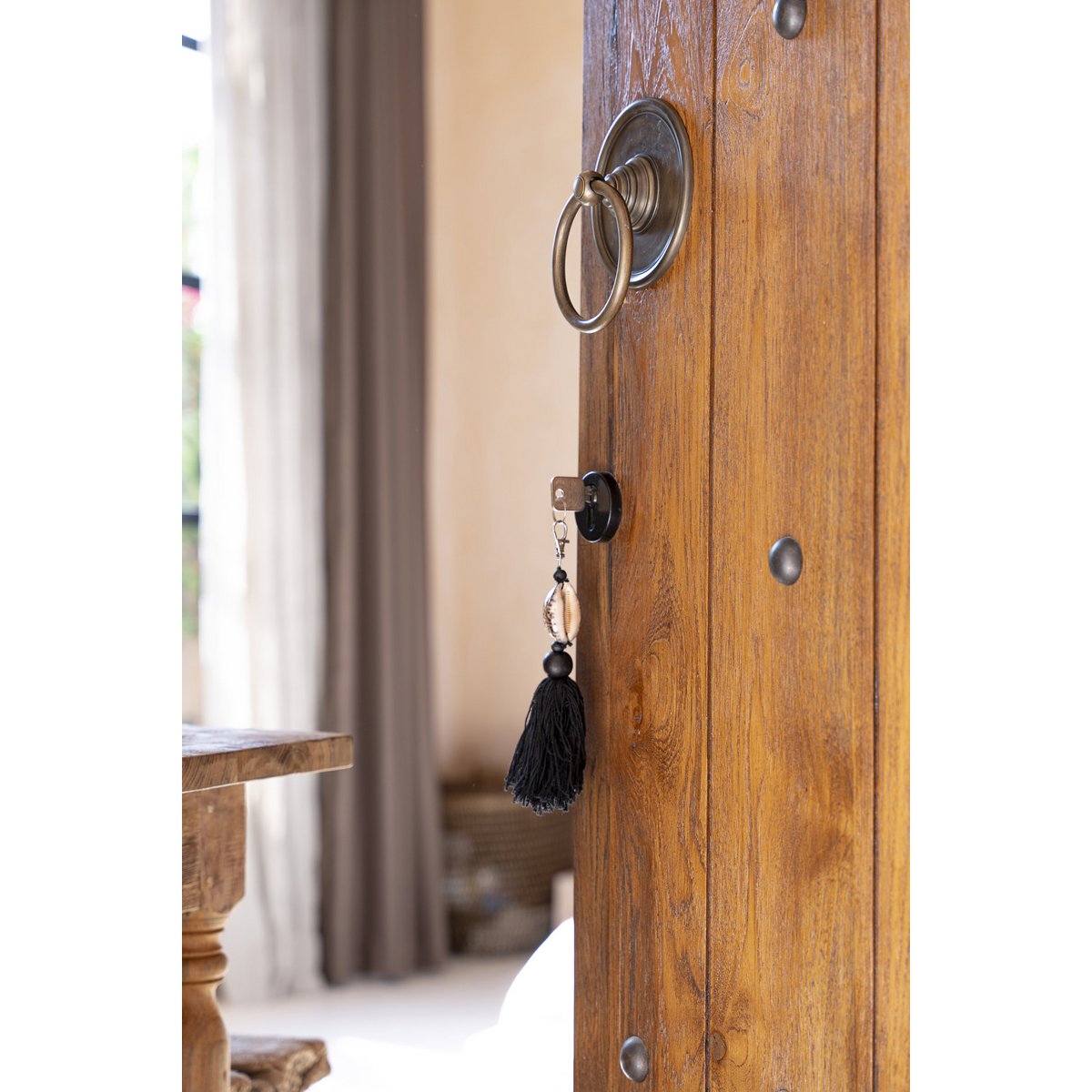 De Sumbawa sleutelhanger - zwartbruin